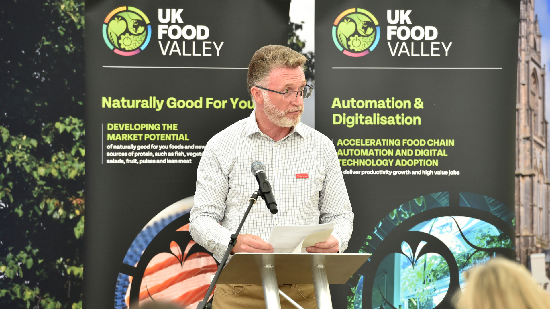 Cllr Liam Kelly speaking at event