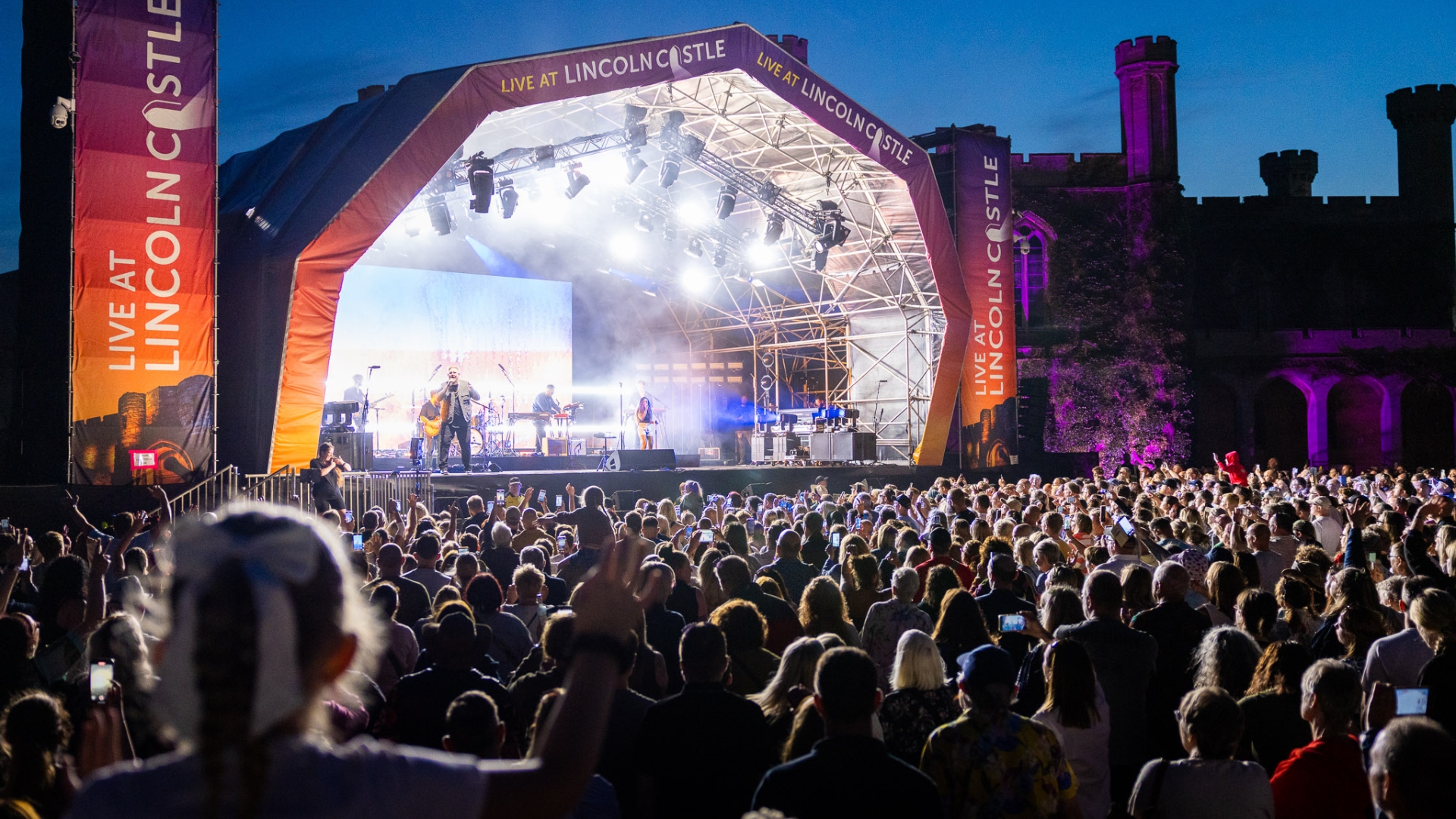 Rag'n'Bone man performing on stage at Lincoln Castle