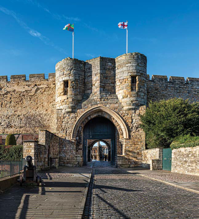 Approach view of Lincoln Castle showing the view through the main entrance