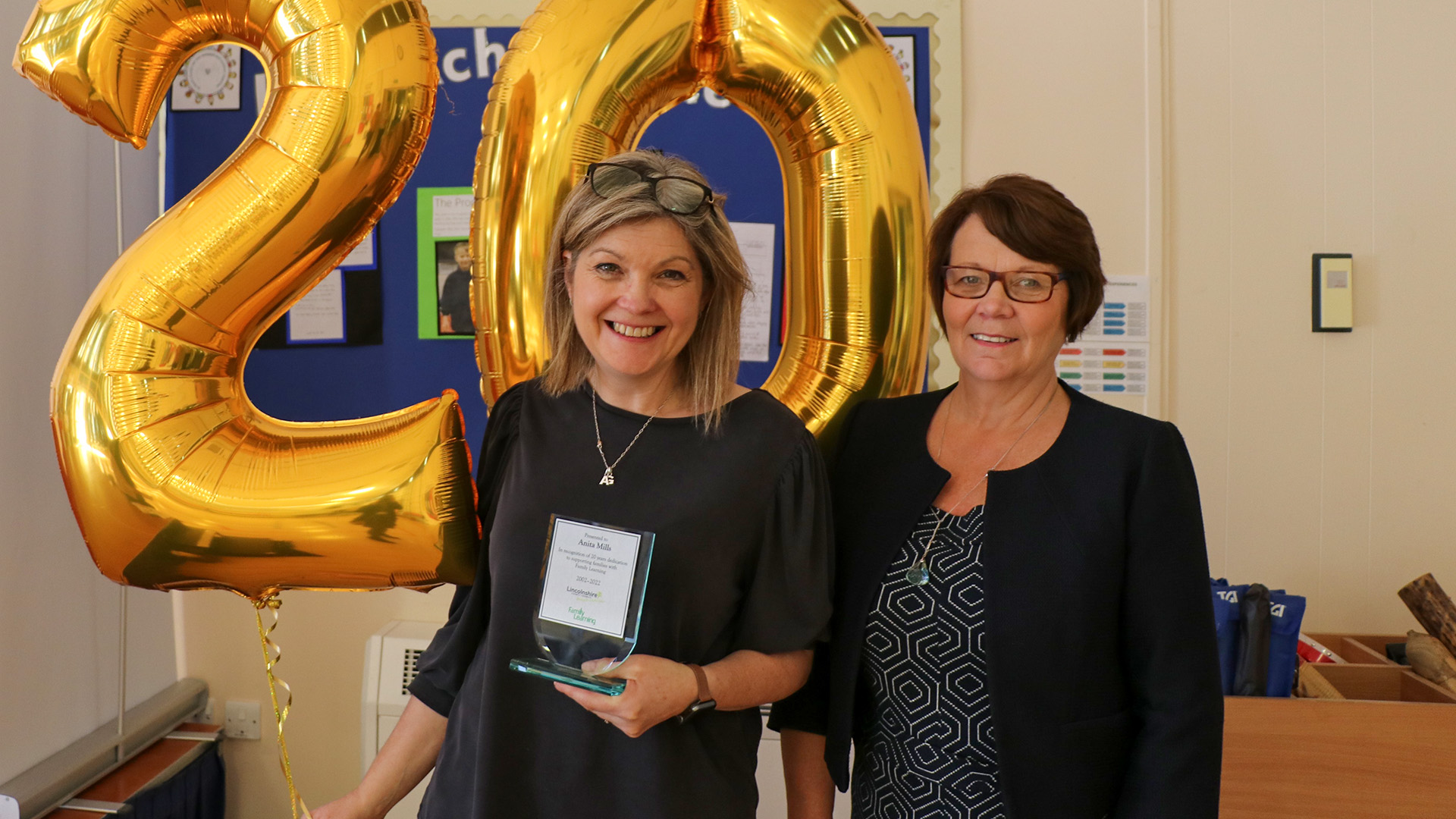 Anita Mills receives her award from Cllr Wendy Bowkett