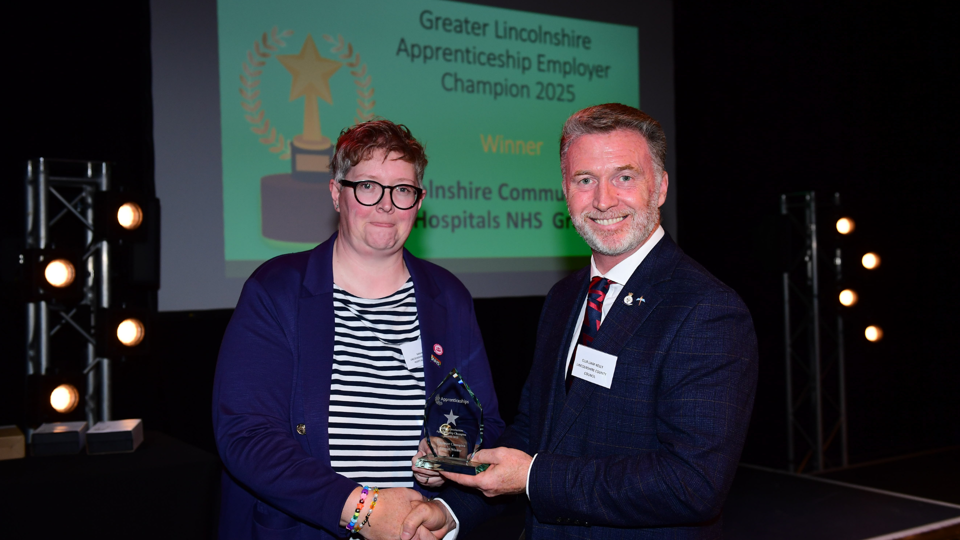 Cllr Liam Kelly presenting Sarah Lewis with the Employer Champion award