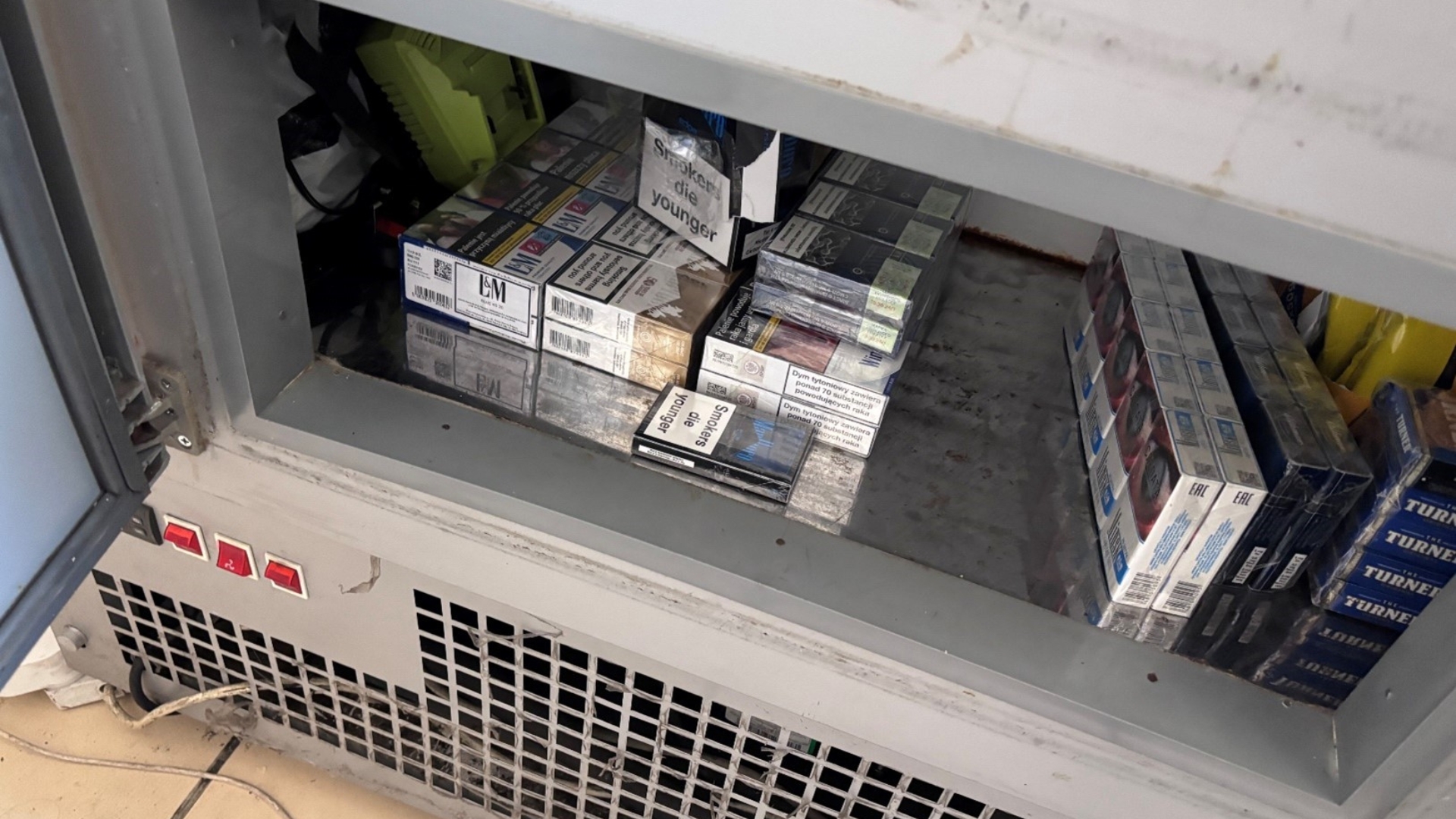 Illegal cigarettes in a refrigerator unit at the Fruit Shop in Boston