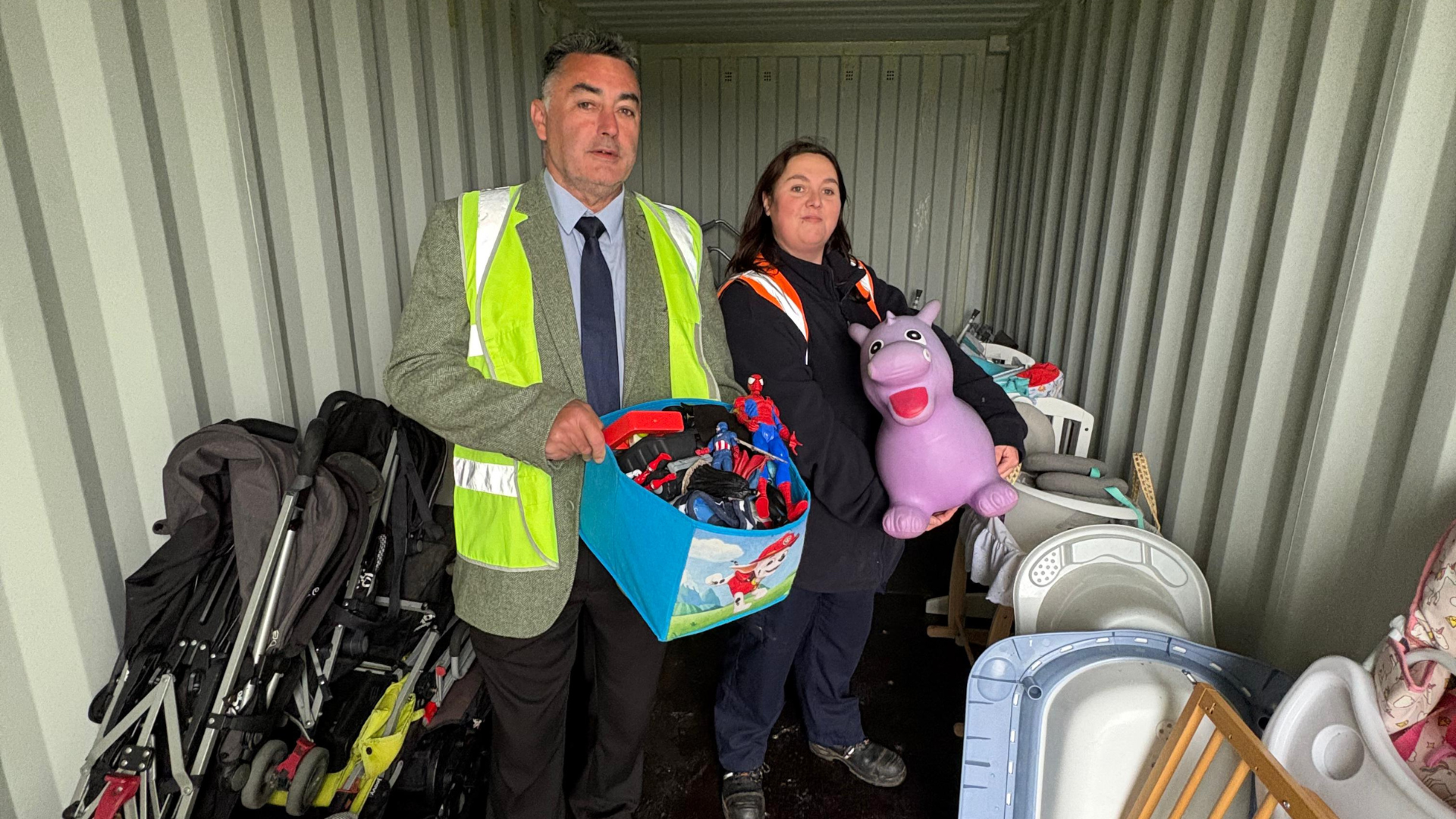 Cllr Danny Brookes and Ro Holmes with donated items for charity reuse at Tattershall HWRC