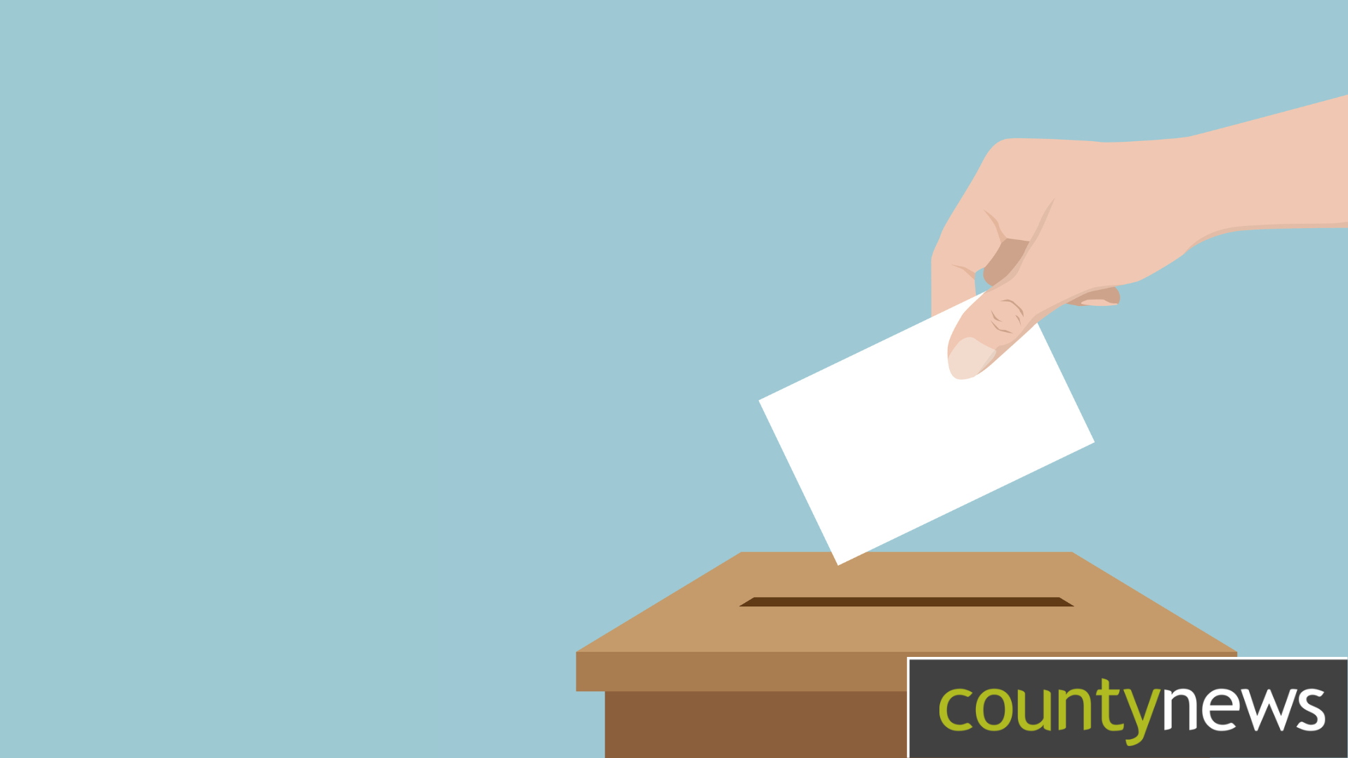 A vote being cast in a ballot box