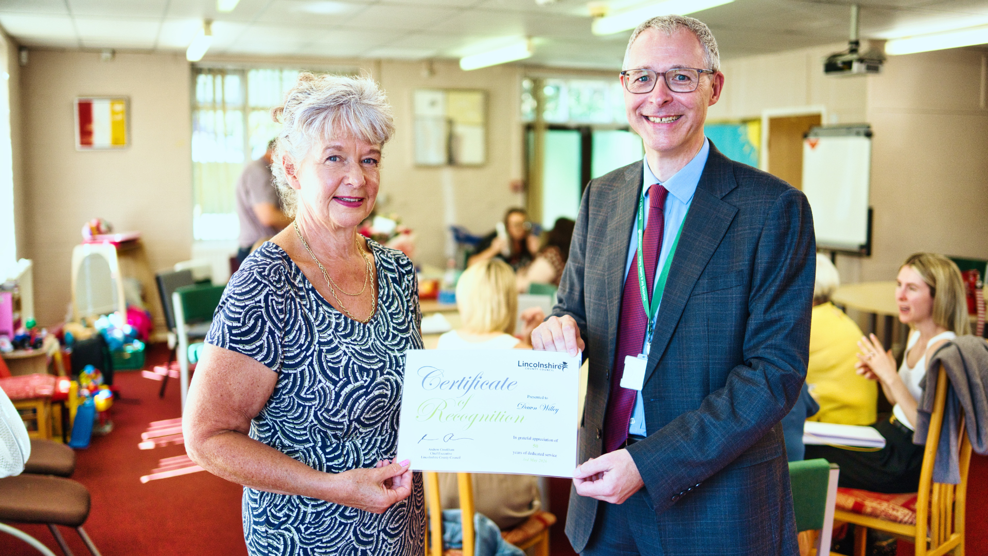 Martin Samuels presenting Dawn Willey with a certificate