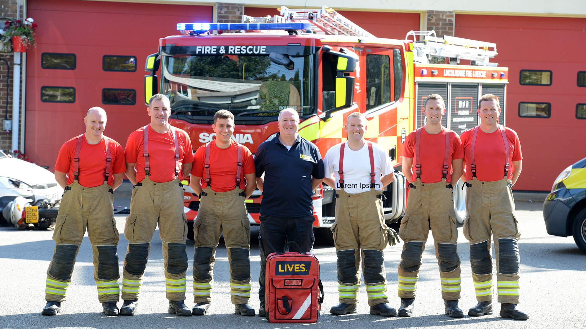 Firefighters with their LIVES trainer