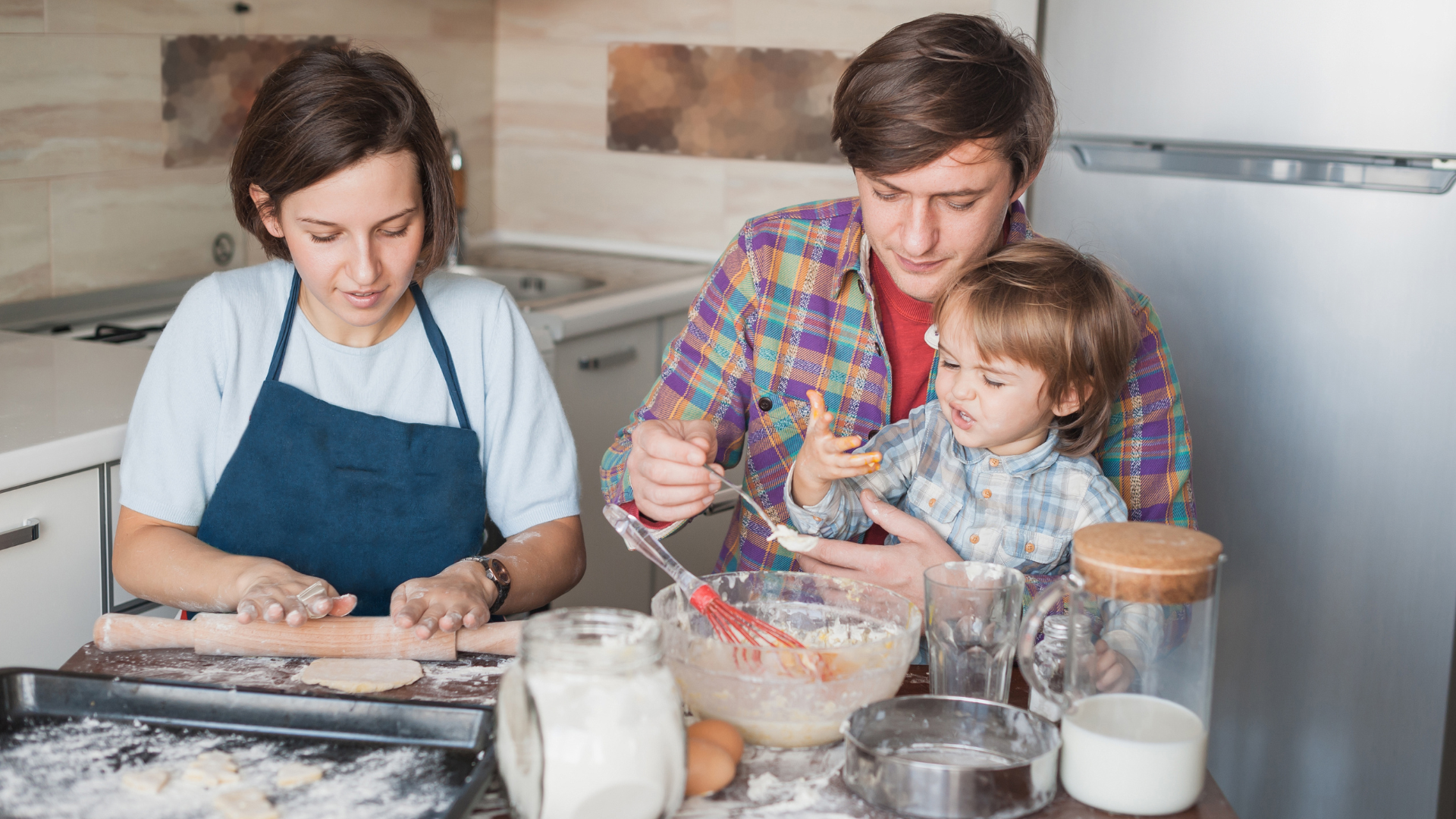A family baking in the kitchen together