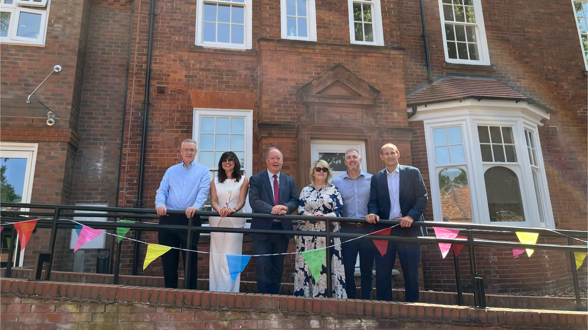 Cllr Steve Clegg and LCC staff at the opening of Grange House