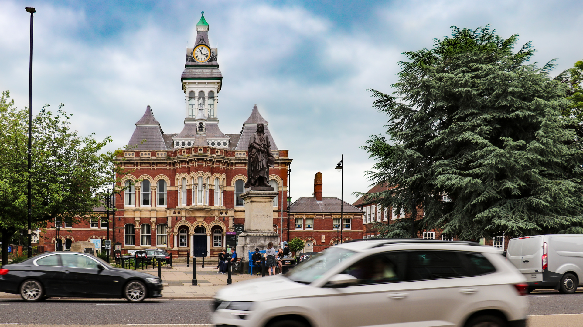 A car drives past a building in Grantham