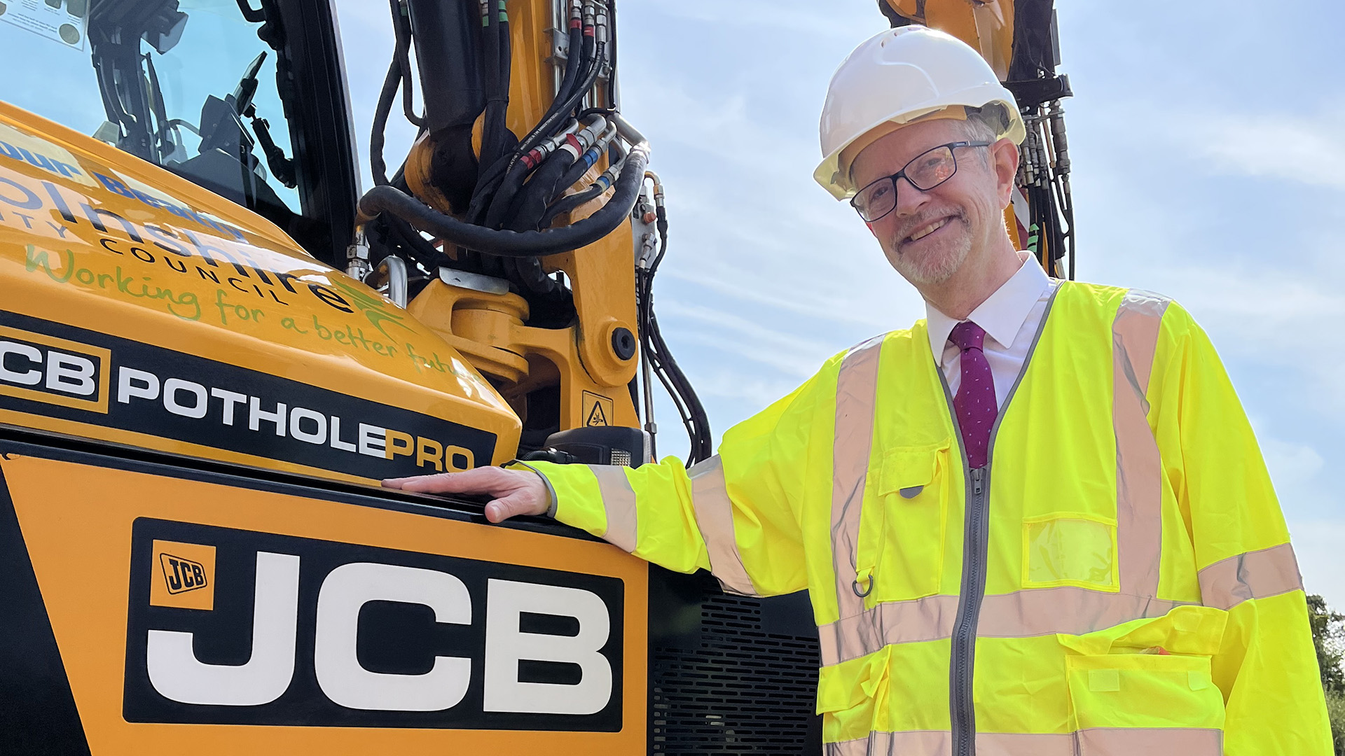 Cllr David East and the pothole pro
