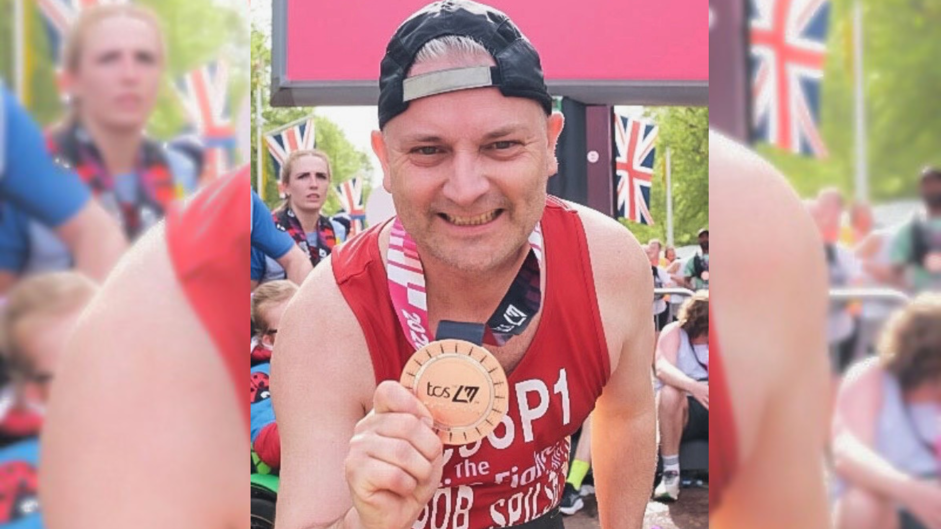 Bob with marathon medal