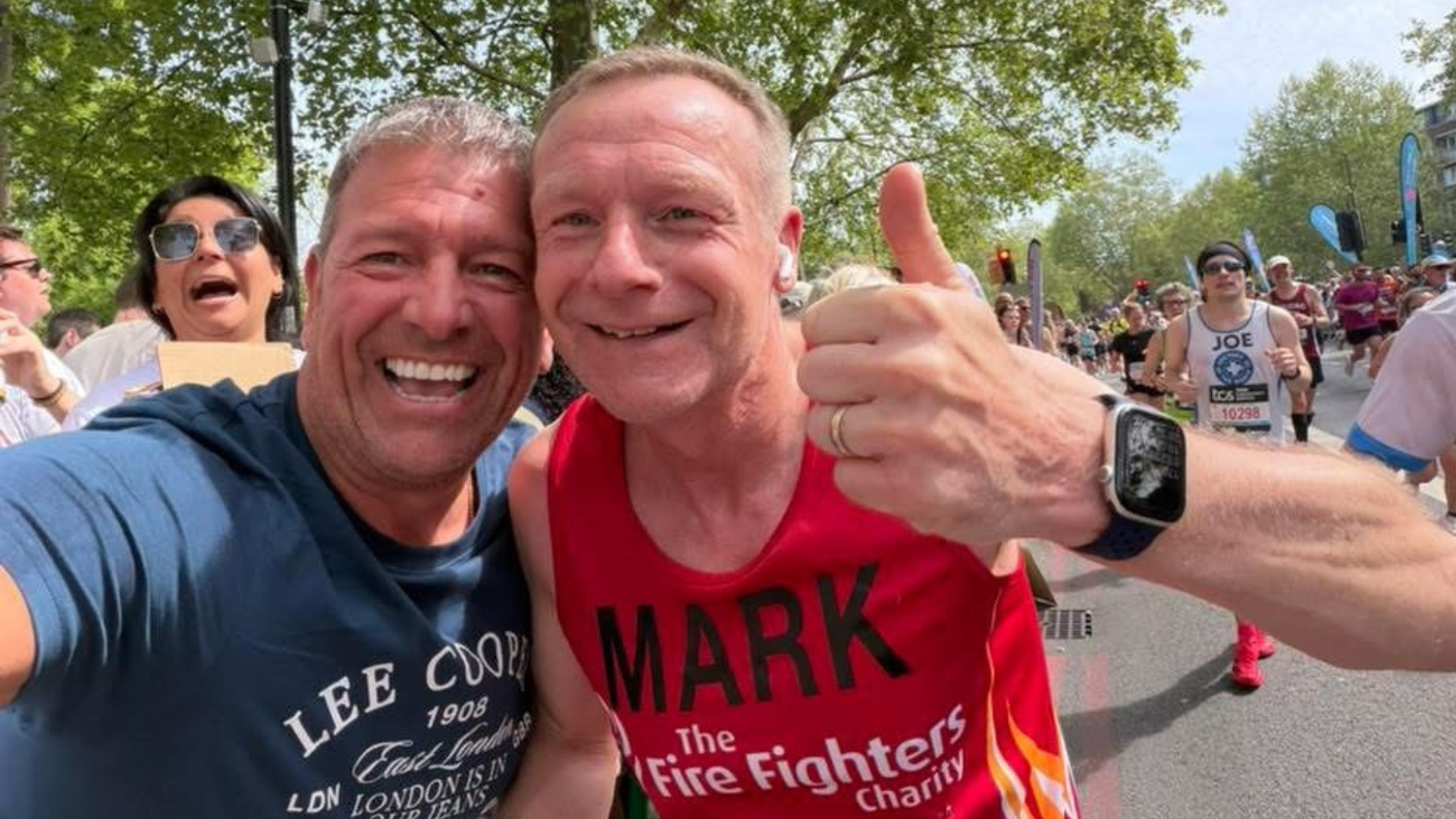 Mark giving thumbs up during race