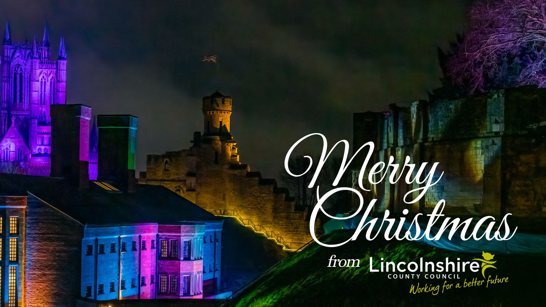 Lincoln Castle Illuminated, with text &#039;Merry Christmas from Lincolnshire County Council&#039;