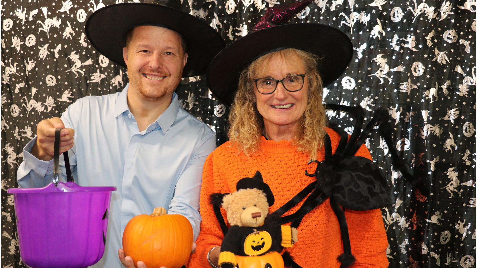 Cllr Stuart Grantham and Vicki Connolly from CVS, smiling with Halloween props