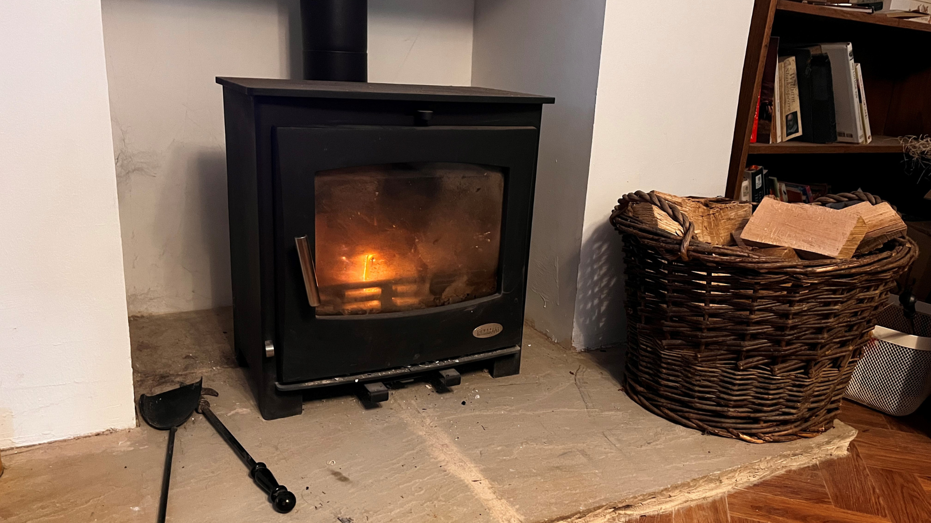 A lit log burner