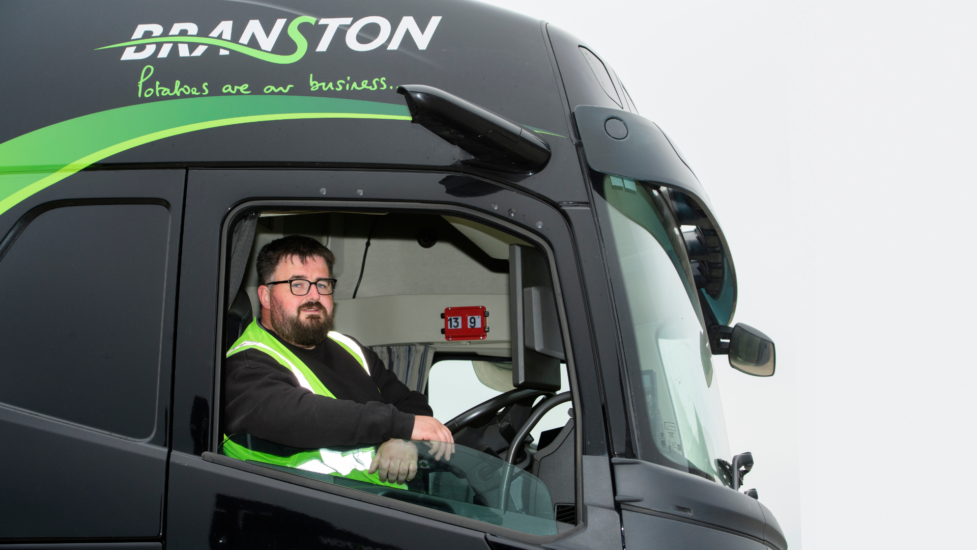 Man sat in cab of lorry