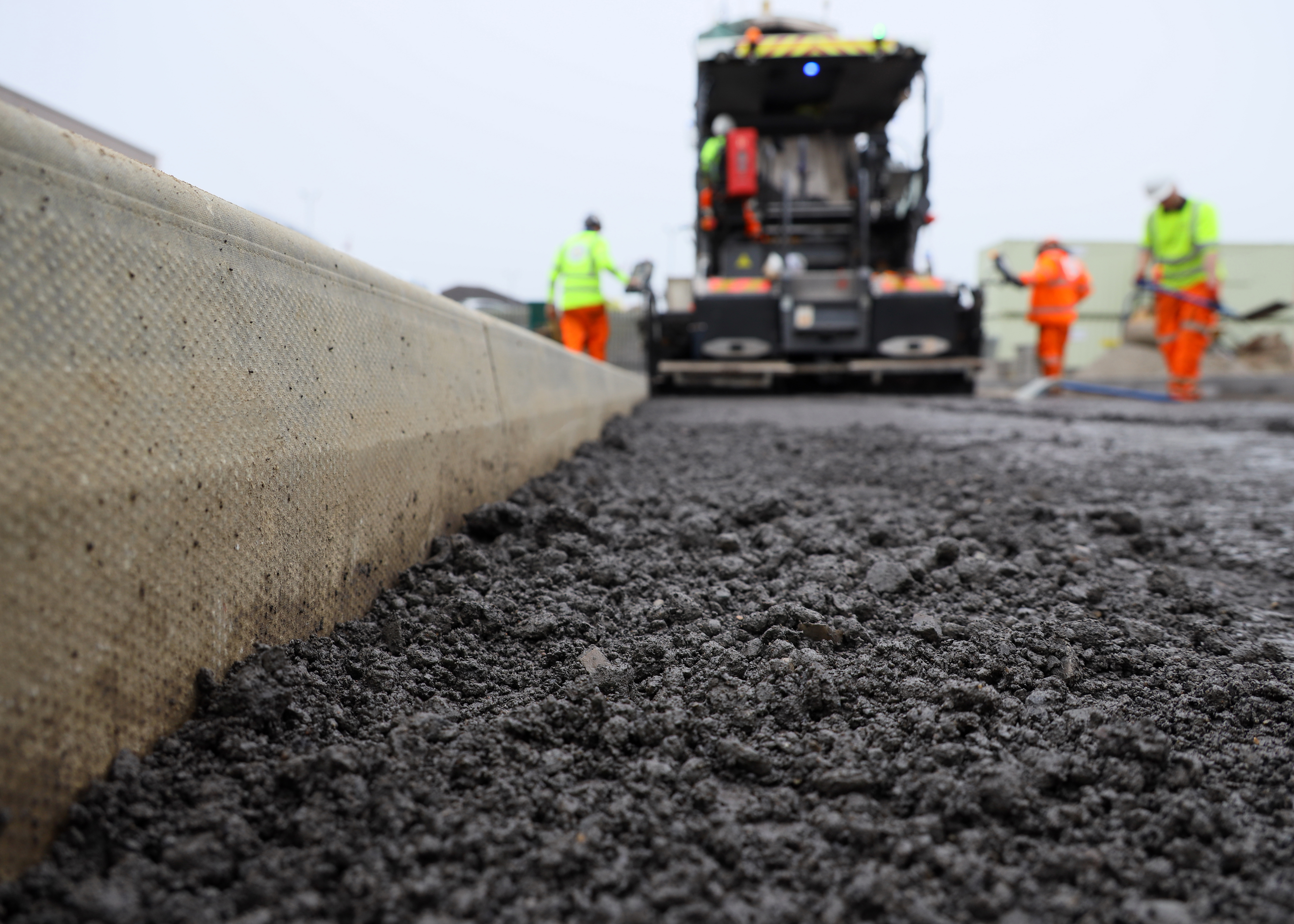 Kerb and machine highways roadwork gang