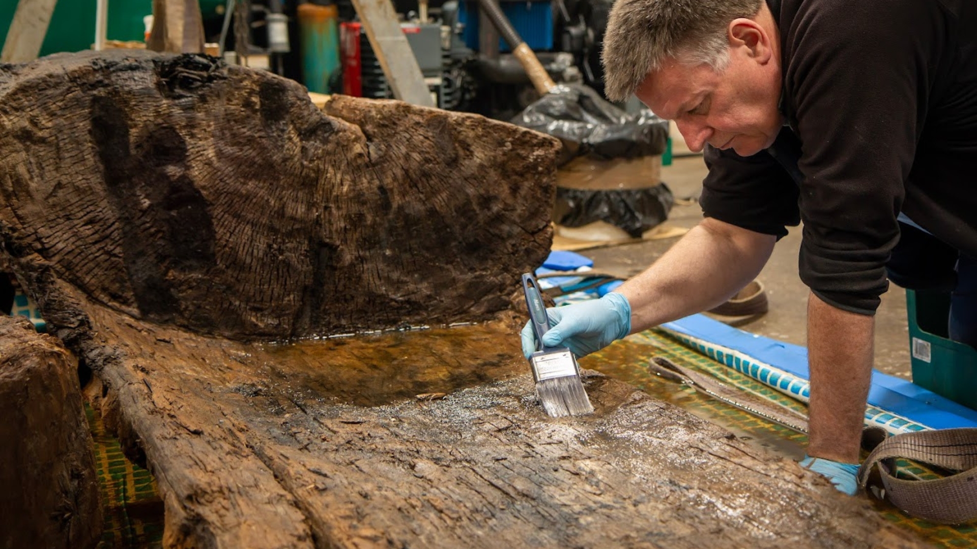 Ian Panter, Head of Conservation at York Archaeological Trust, pictured with the coffin. Image credit: York Archaeological Trust