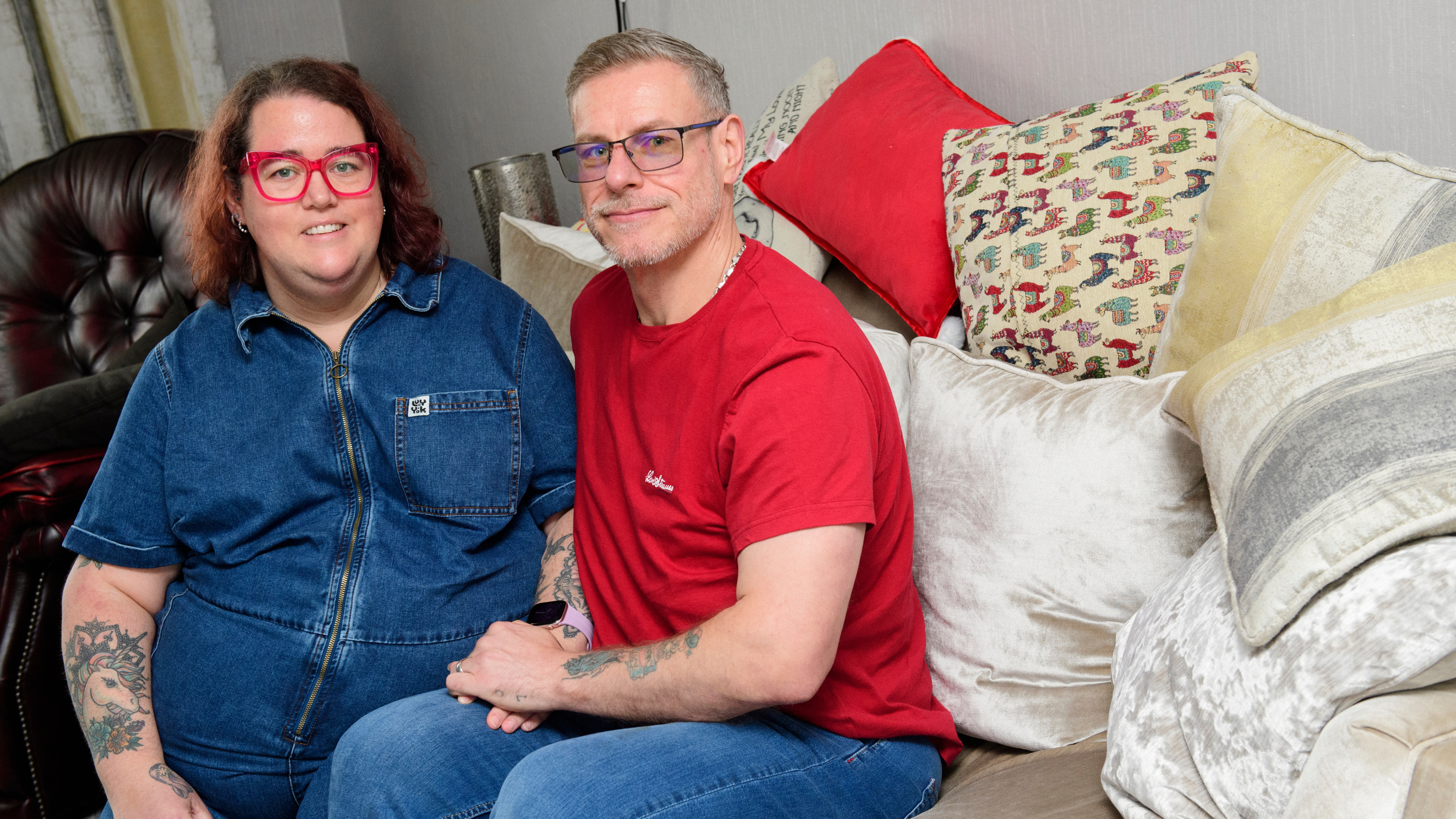 Dan Fleshbourne, and his wife Nicci sat on sofa