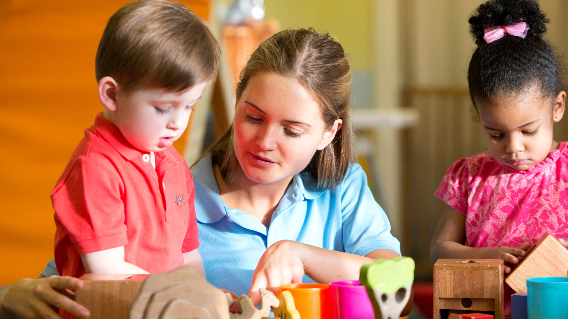 A childminder and young toddlers
