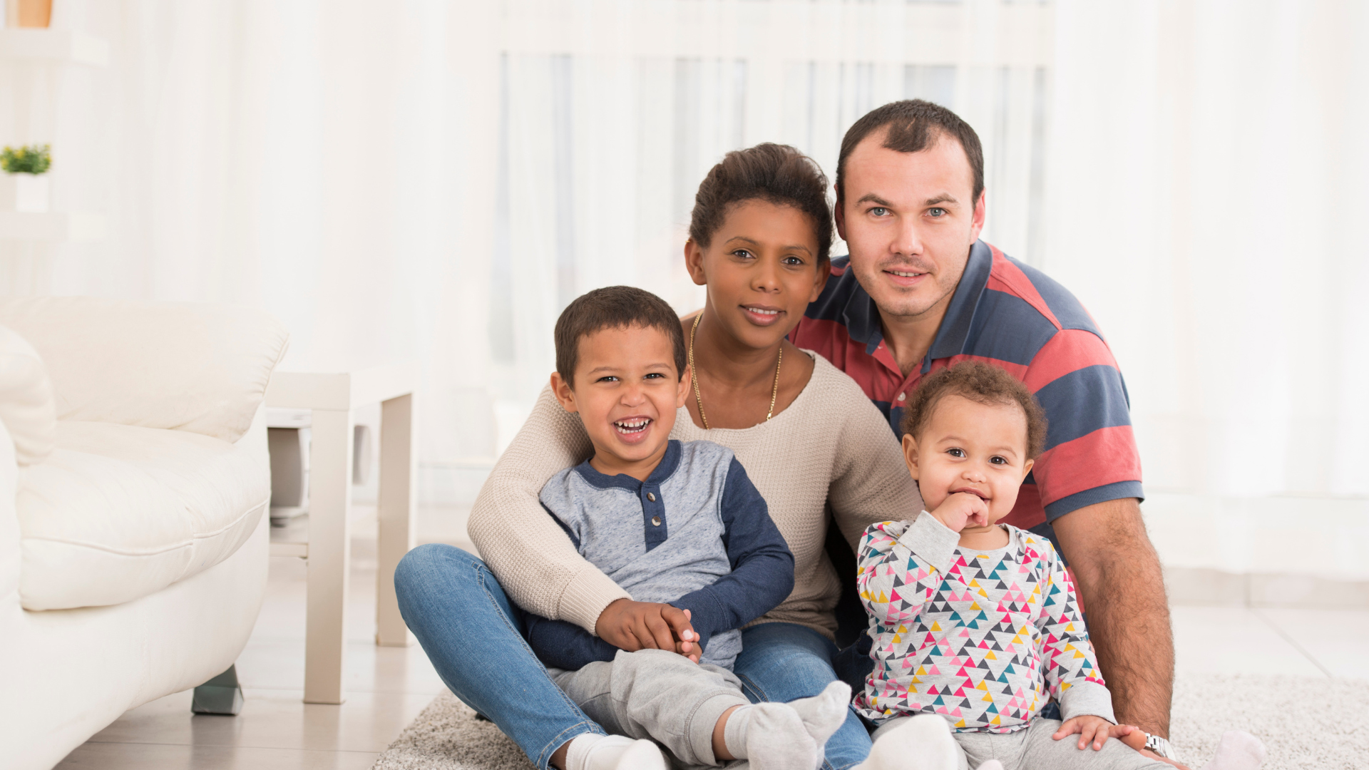 A family sat in their living room