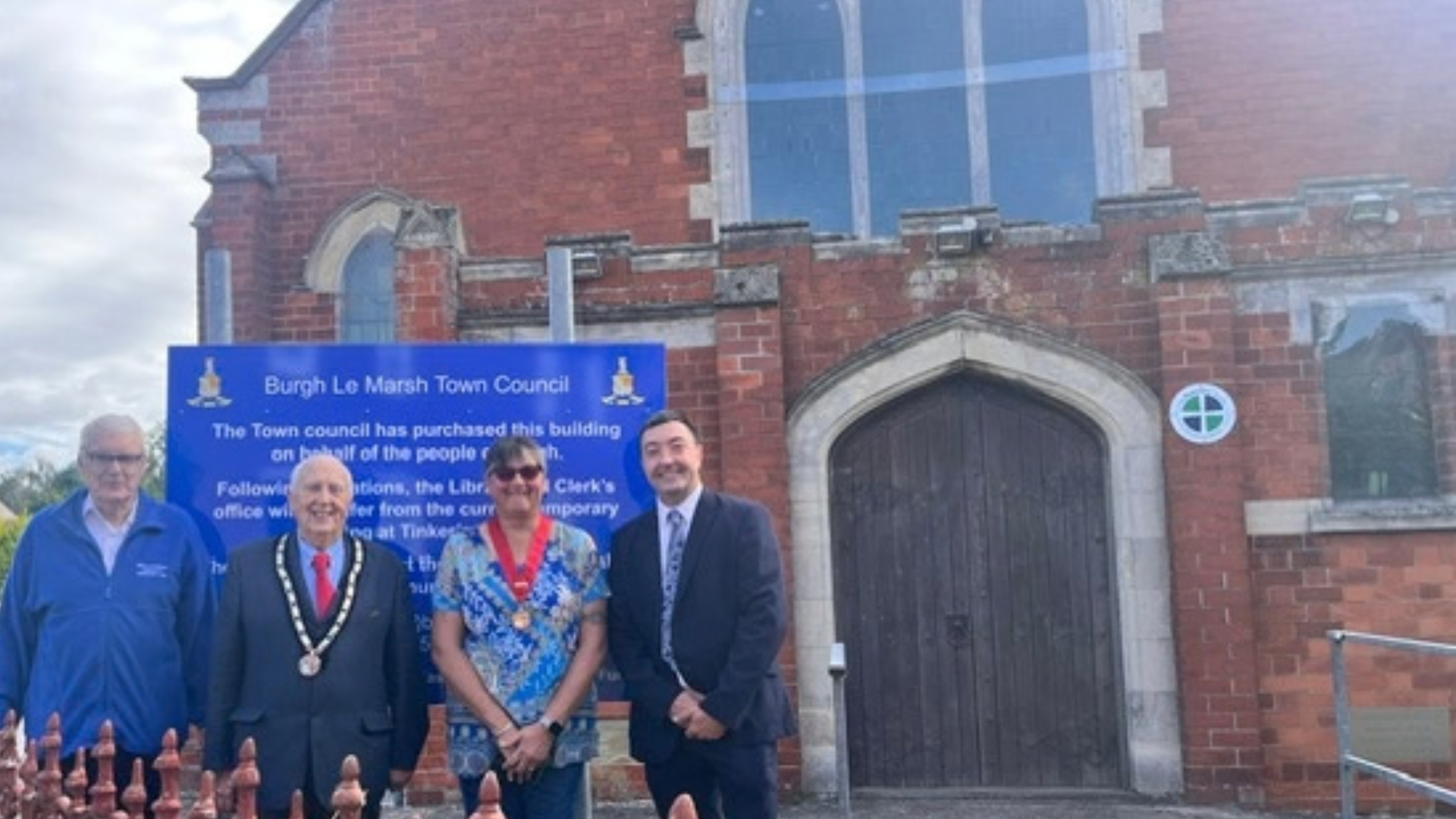 Councillor Jimmy Brookes with three members of Burgh le Marsh town council outside the methodist church building