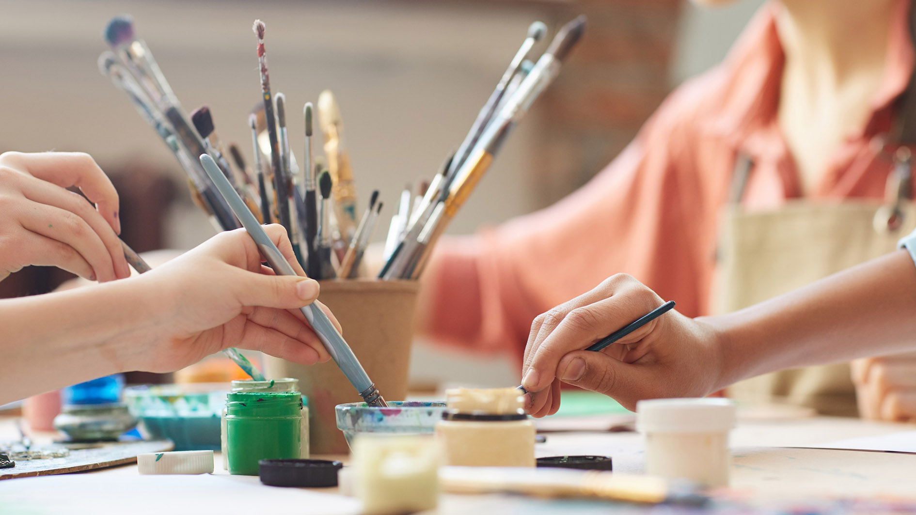 Children using watercolour paints