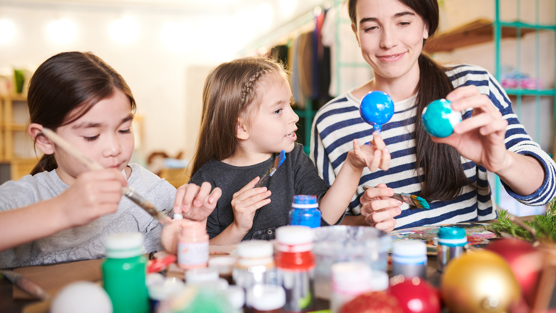 Children making handmade ornaments