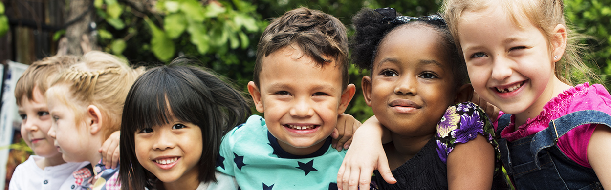 Image of a group of children smiling