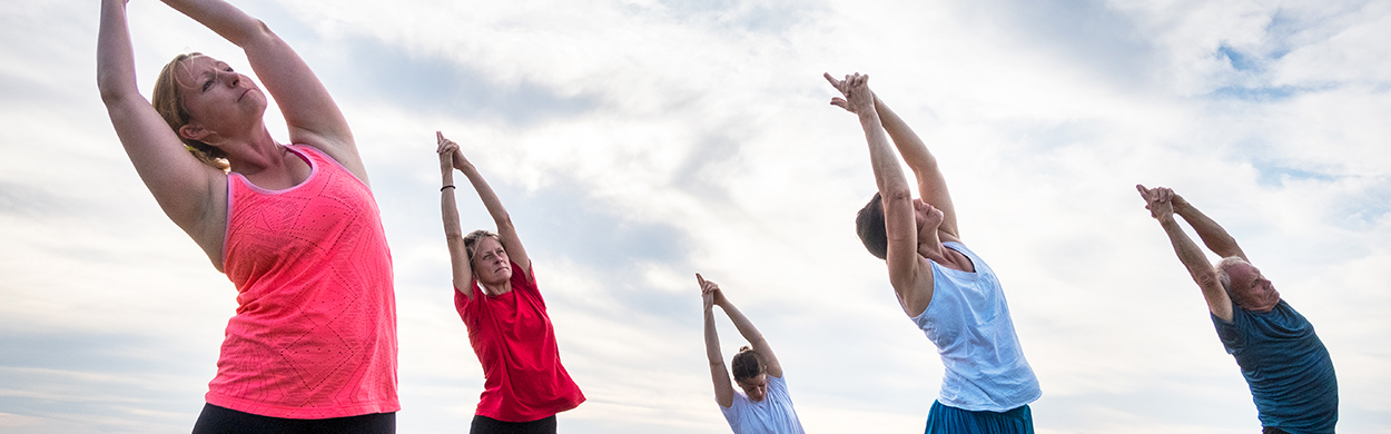 Image of people doing yoga