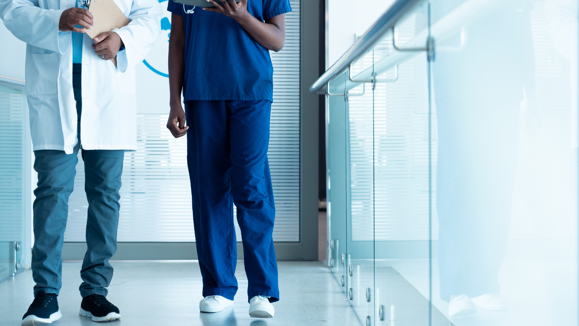 Doctor and nurse in hospital corridor