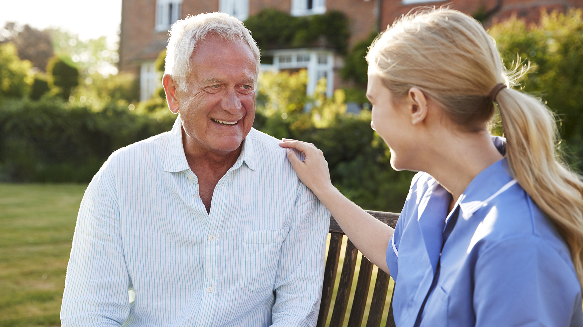 Nurse talking to man