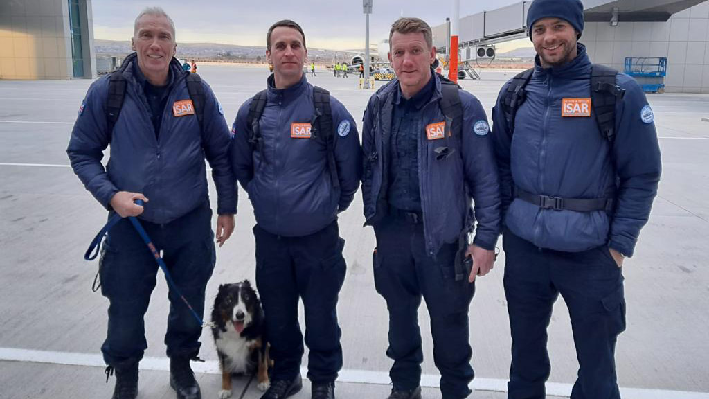 and Dog Handler, Neil Woodmansey with dog Colin